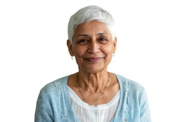 Smiling elderly Indian woman with short hair.