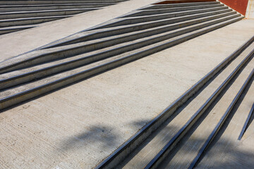 A series of steps with a concrete surface