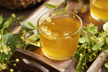 Linden flower tea in a glass cup