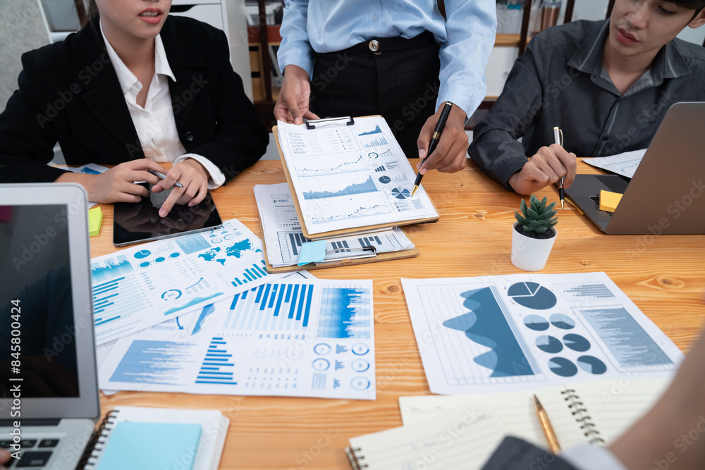 Aufkleber multiracial analyst team use bi dashboard data to analyze financial report on meeting table. group o