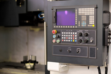 Obraz premium vertical metalworking CNC machining center closeup