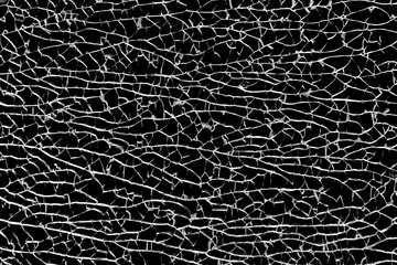 Black and white photo of broken glass with many cracks. Texture of broken tempered glass.