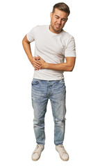 Fototapeta premium Full body portrait of a man in studio having a liver pain, stomach ache.