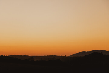 landscape view of orange sunset in nature