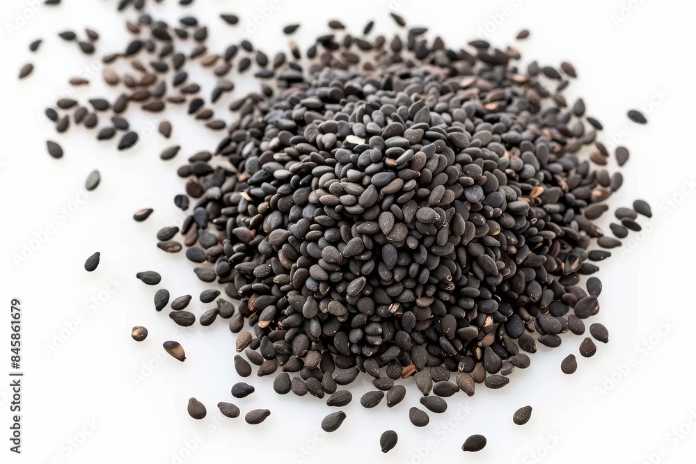 Wall mural Top view of isolated black sesame seeds on white background