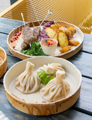 Georgian khinkali, minced meat chinkali, spicy dumplings also called dimsum, momo, jiaozi, manti