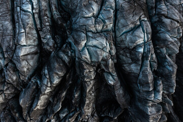 Rocky formation with stone surface in textured pattern