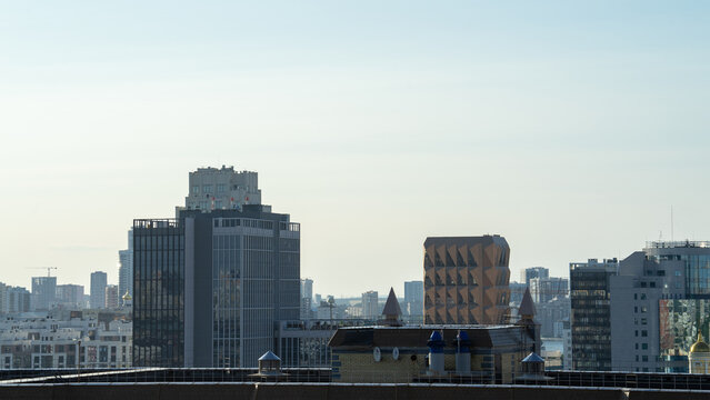 View of city Yekaterinburg from roof of building. Residential areas and high-rise buildings in center of city. Residential development in Russia, Urals