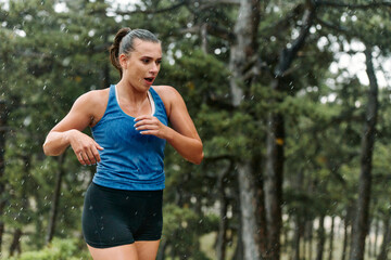 Unstoppable: A Determined Athlete Trains Through the Rain in Pursuit of Marathon Glory