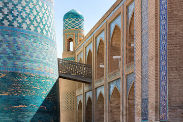 Minaret kalta minor and Muhammad amin khan madrasah in Itchan Kala ancient town Khiva, Uzbekistan.