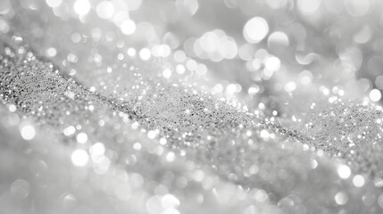 Scattered silver dust in waves across