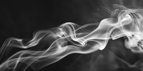 Black and white closeup of incense stick smoke in an abstract image