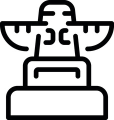 Ancient wooden totem pole standing on a pedestal representing native american culture and history