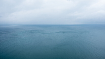 Cloudy skies over a turbulent Lake Michigan