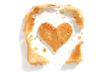 Pieces of toast, one in the shape of a heart