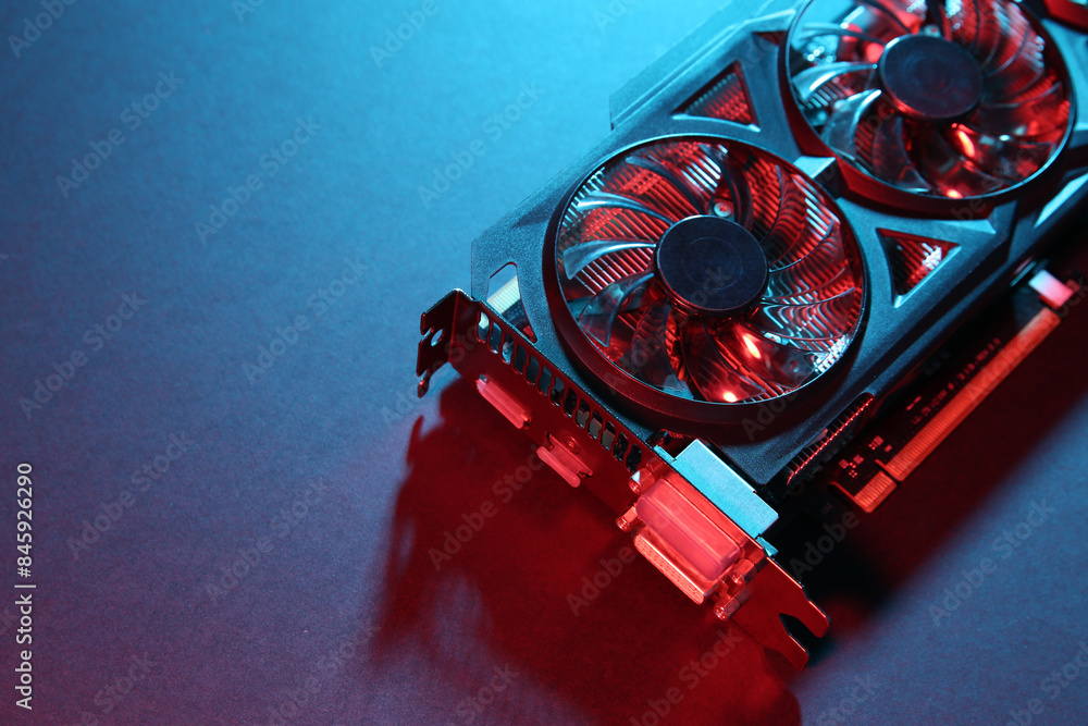 Poster computer graphics card on color background, closeup. space for text
