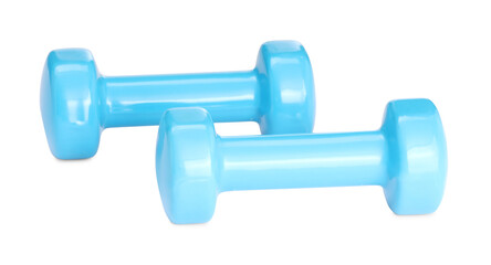 Light blue dumbbells isolated on white. Sports equipment