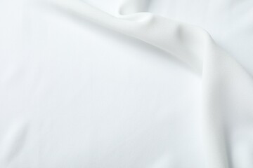 Fototapeta premium Texture of white fabric as background, top view