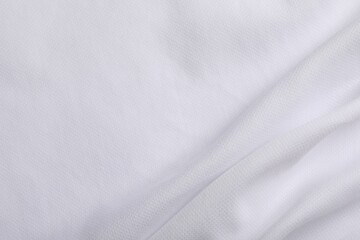 Fototapeta premium Texture of white fabric as background, top view