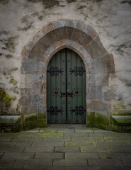 the old door of in stone wall