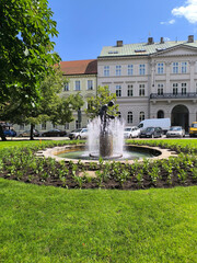 Fountain with sculpture in the central park in summer, Pilsen, Czech Republic