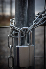 the metal lock and the fence