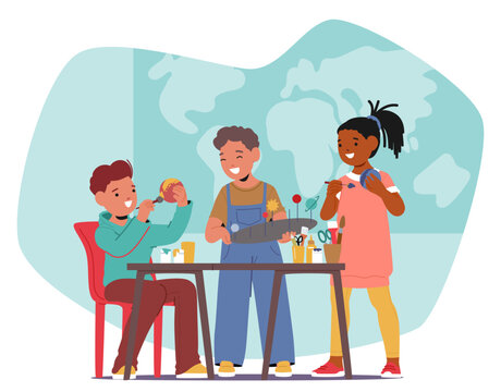 Three Children Are Collaborating On An Art And Craft School Project In A Classroom Setting. They Are Engaged