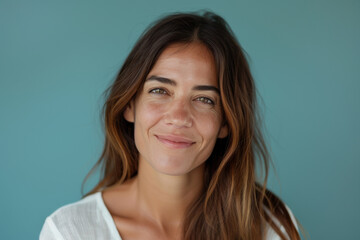 Fototapeta premium A close up portrait of a woman with a subtle smile