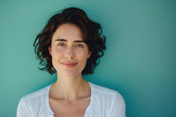 A close up portrait of a woman with a subtle smile