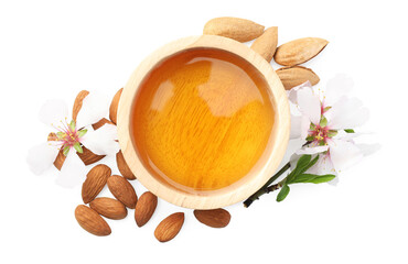 Almond oil in bowl, flowers and nuts isolated on white, top view