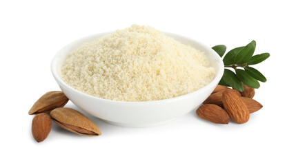 Fresh almond flour in bowl branch with leaves and nuts isolated on white