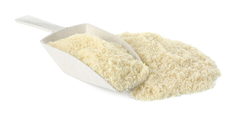 Pile of fresh almond flour and scoop isolated on white