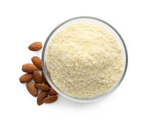 Fresh almond flour in bowl and nuts isolated on white, top view