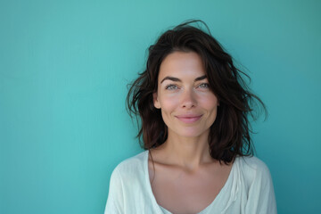 Fototapeta premium A close up portrait of a woman with a subtle smile