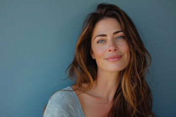 Fototapeta premium A close up portrait of a woman with a subtle smile
