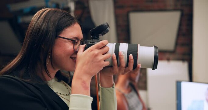 Camera, photographer and flash in studio for photography, media and magazine cover as creative. Cameraman, focus and female person backstage for shooting, production and film as director with lens