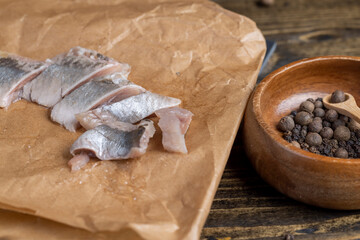 salted herring fillet on the table