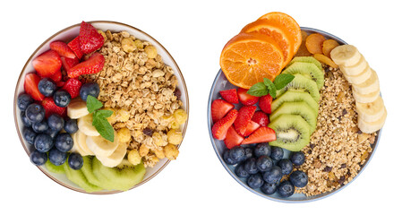 Granola with strawberries, kiwi, banana and blueberries in a round plate