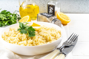 Cooked couscous with cilantro