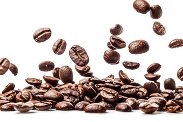 Naklejka premium coffee beans falling isolated on white background in studio photo