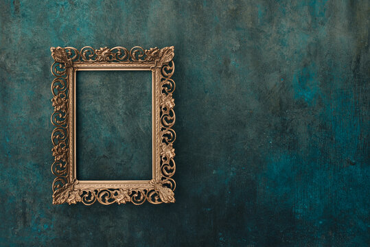 Metal brass frame mockup on a wall
