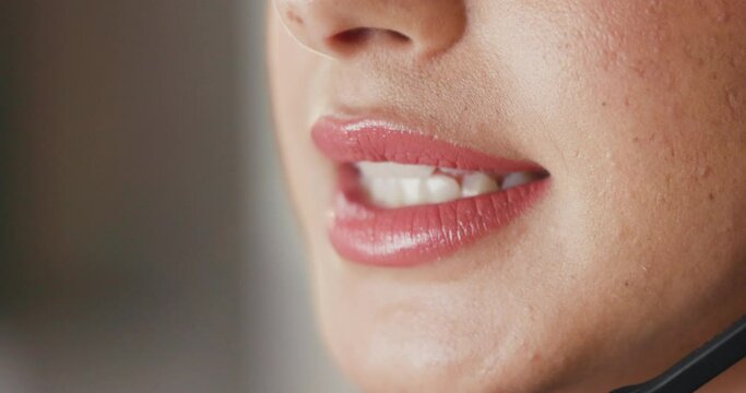 Business woman, callcenter and mouth with phone call for customer service, support or help at office. Closeup of female person, employee or agent lips talking for communication, CRM or telemarketing