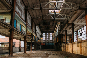 Large abandoned industrial hall interior