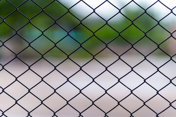 Close up chain link fence with blurred background