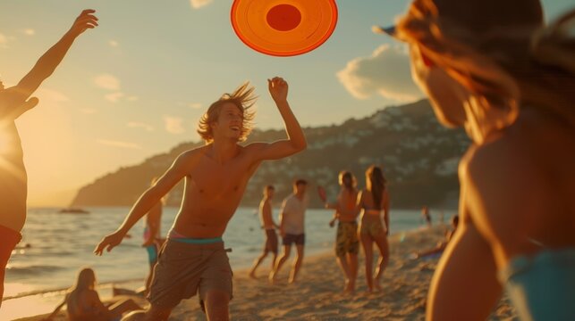 Friends playing a game of frisbee on the beach while waiting for the food to be prepared.
