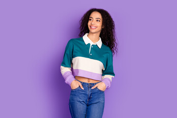 Fototapeta premium Photo of nice young girl look empty space wear shirt isolated on violet color background
