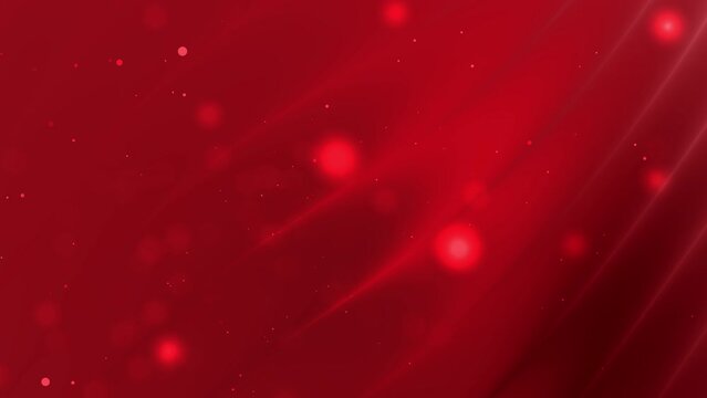 Abstract red gradient background with small white dots suitable for festive designs, holiday prints, digital backgrounds, Valentines Day concepts, and party invitations.