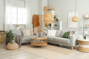 Comfortable sofas and coffee table in interior of living room