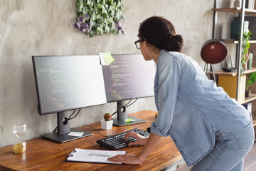 Profile photo of young girl professional hacker use computer loft interior modern office indoors