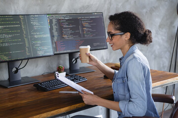 Portrait of young girl it specialist read clipboard drink coffee loft interior business center...